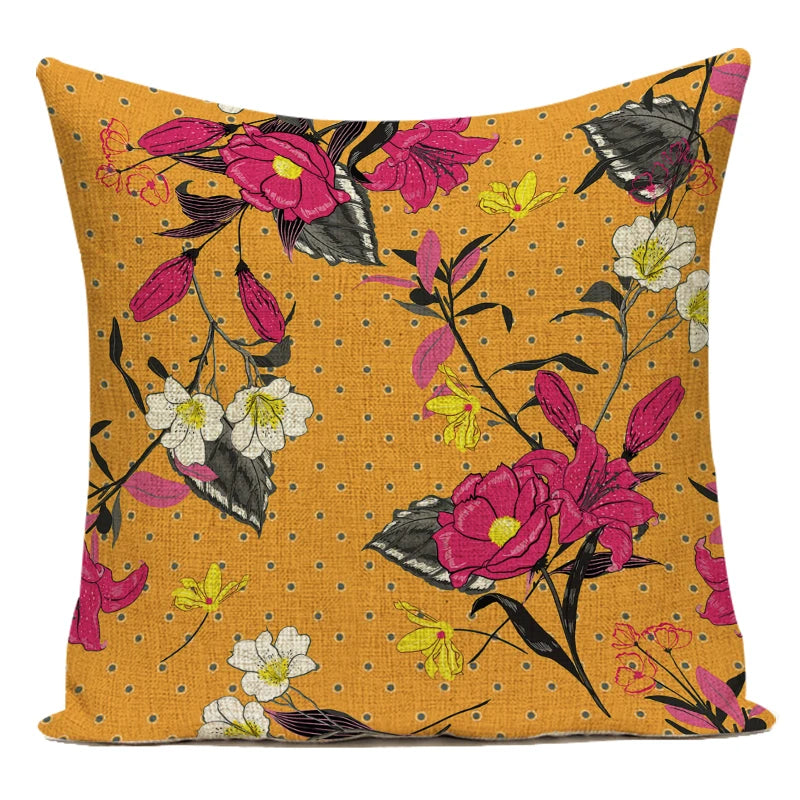 Decorative pillow with floral pattern on a mustard yellow background