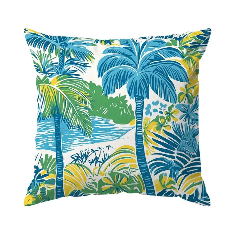Decorative pillow with tropical palm tree and leaf pattern on a white background