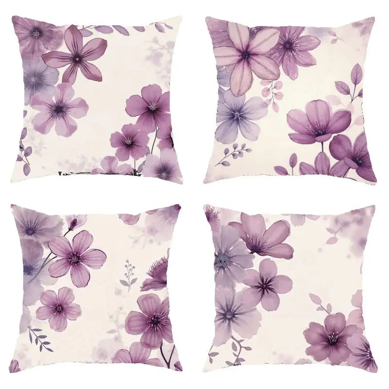 Four purple floral pillow covers
