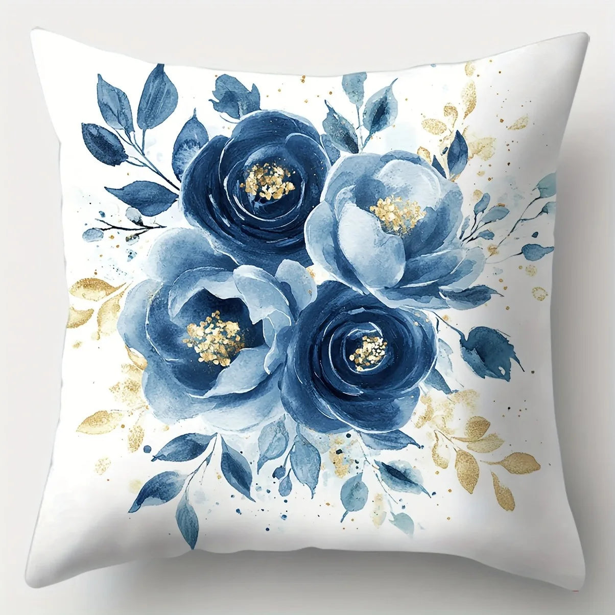 Decorative pillow with blue floral design on a white background