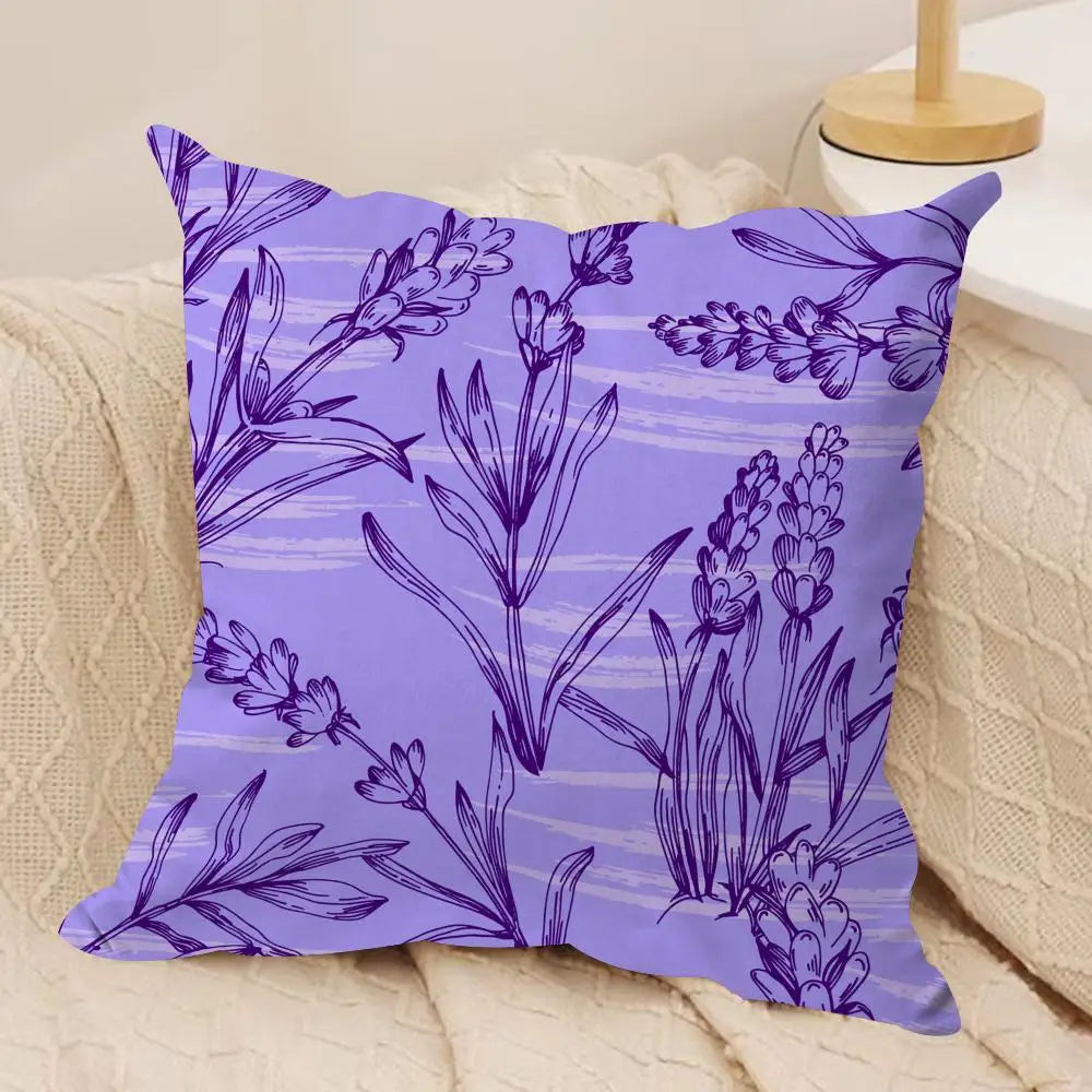 Decorative pillow with purple floral pattern on a beige couch