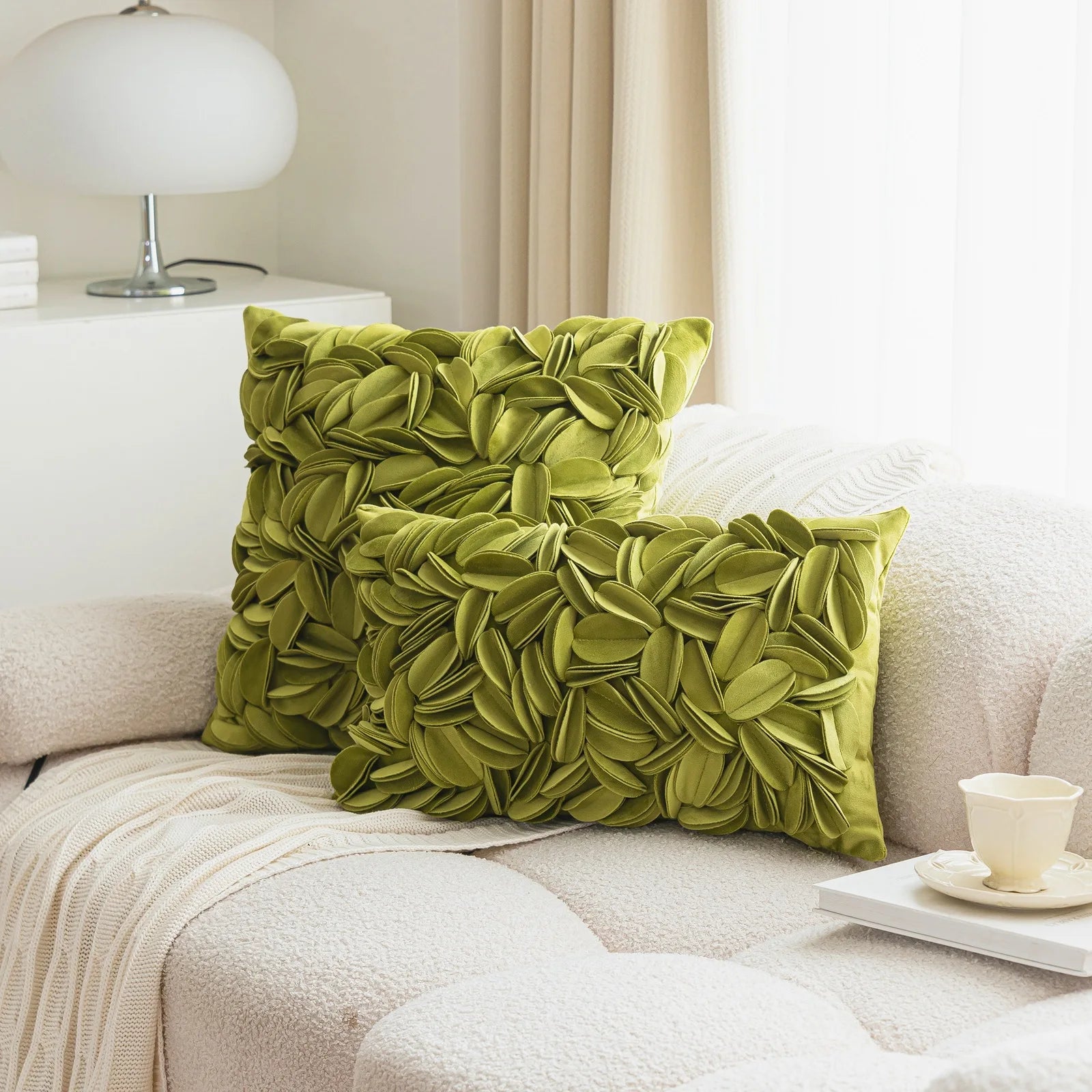 Green luxury velvet pillow cover with floral petal embroidery and elegant textured design