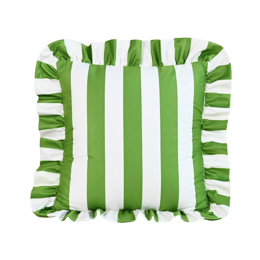 Green and white striped pillow with ruffled edges on a white background