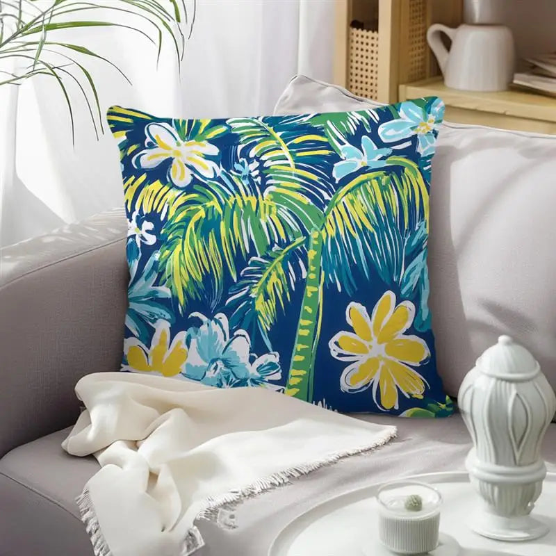 Decorative pillow with tropical design on a couch