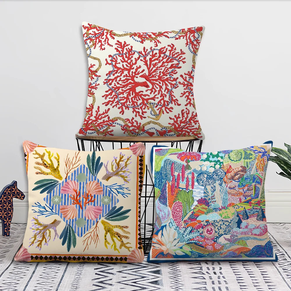 Marine life pillow covers with coral and starfish patterns in colorful coastal design