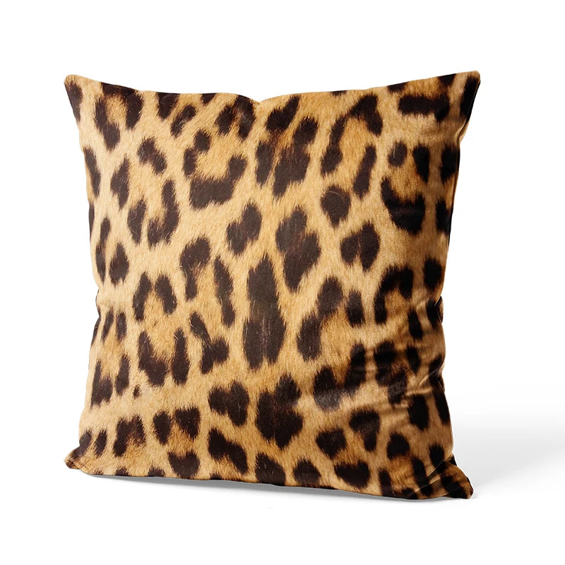 Leopard print pillow on a white background
