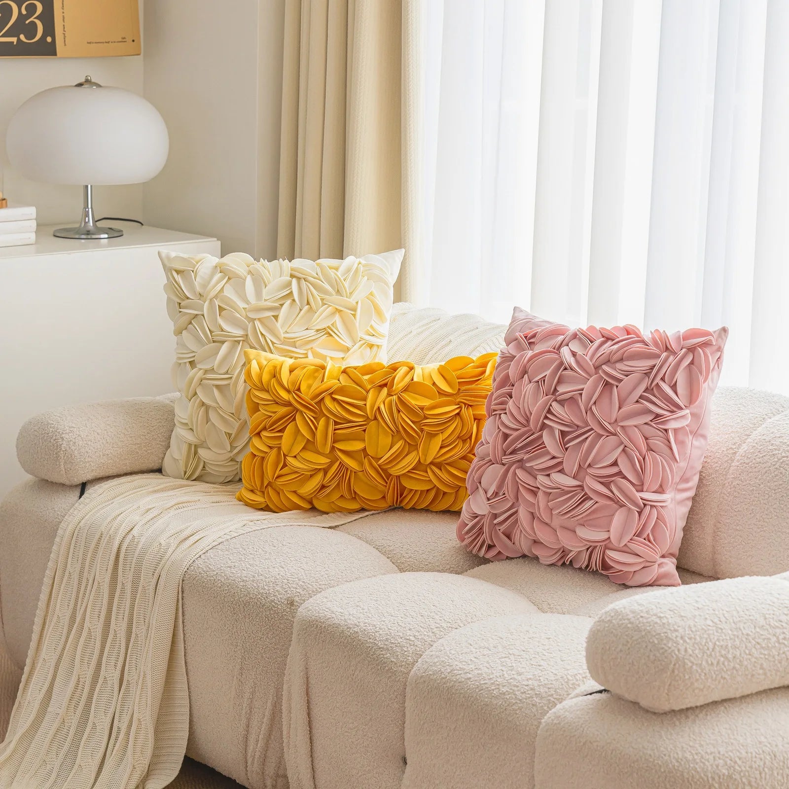 Luxury velvet pillow cover with floral petal embroidery and elegant textured design