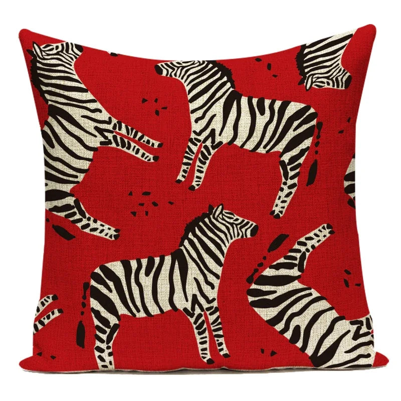 Pillow with zebra pattern on a red background