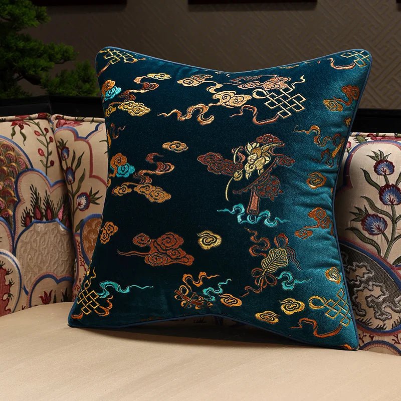 Decorative pillow with intricate patterns on a couch