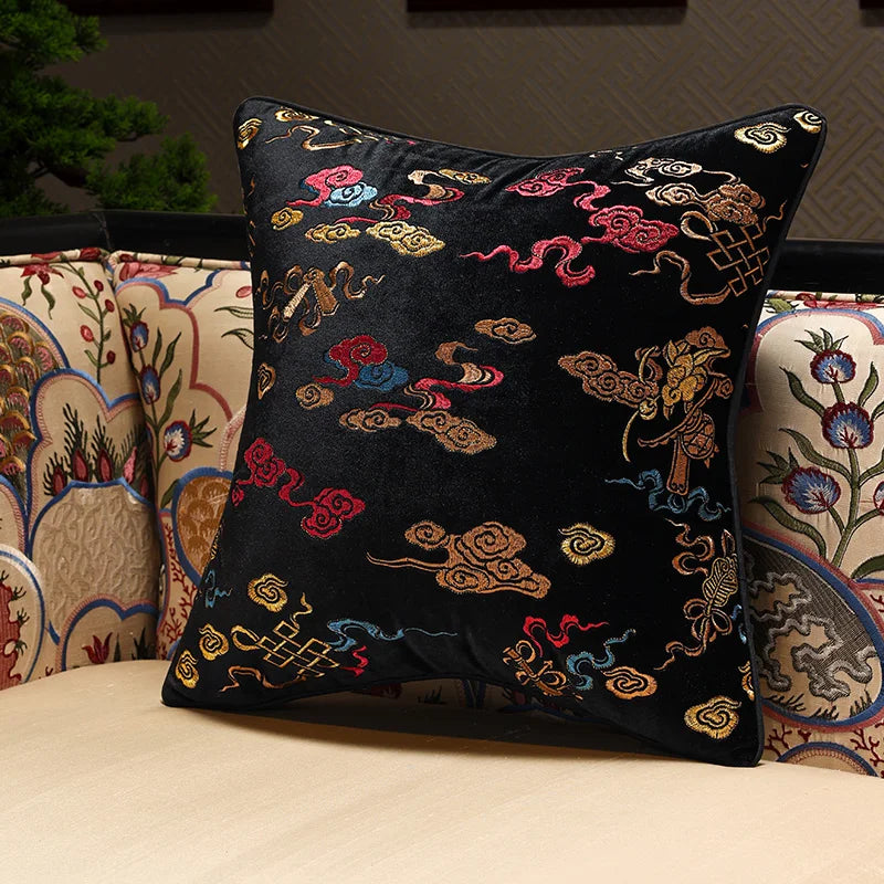 Decorative pillow with intricate patterns on a couch