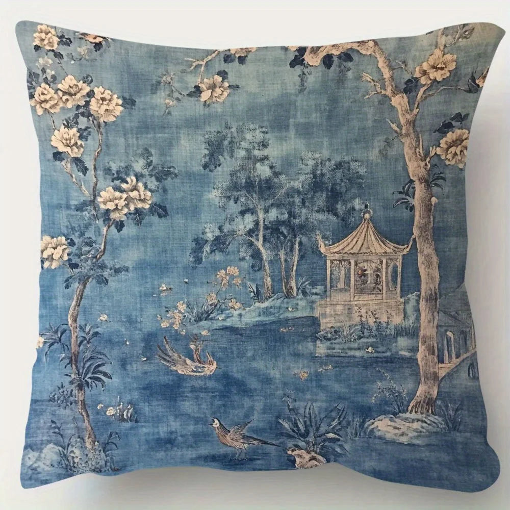 Blue chinoiserie vintage pillow cover with elegant floral and oriental pattern on plush fabric