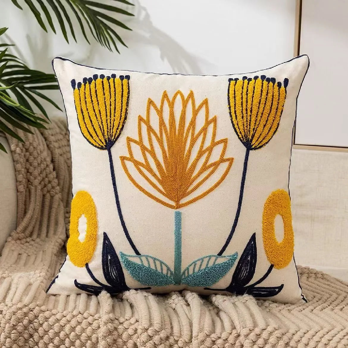 Decorative pillow with floral pattern on a textured surface