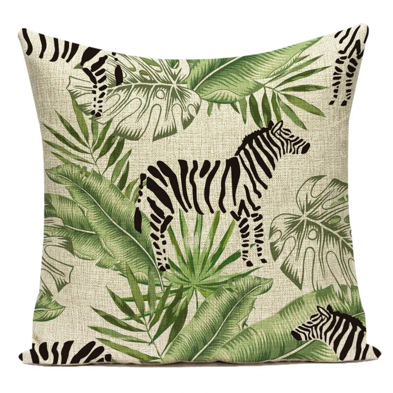 Decorative pillow with zebra and leaf pattern on a beige background