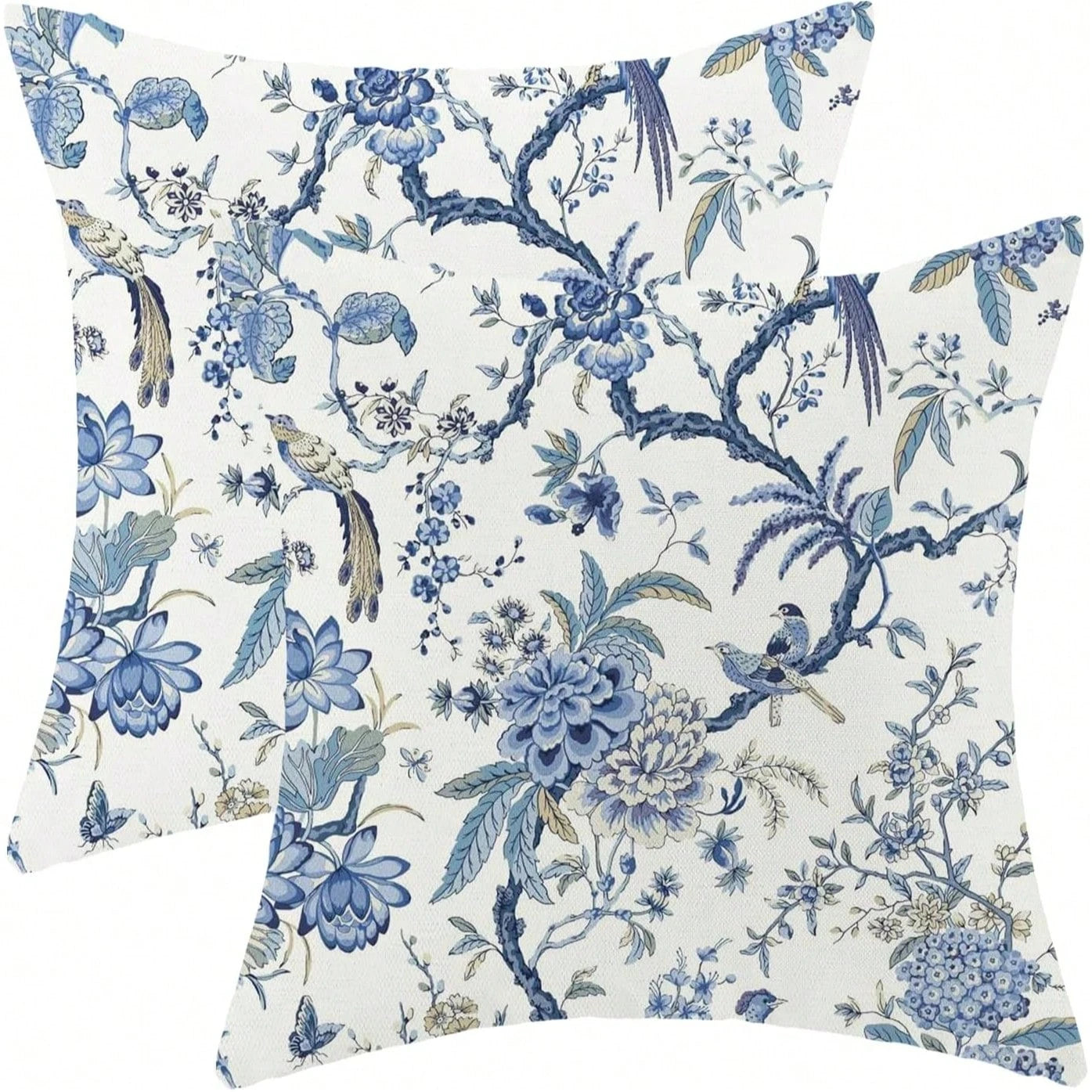 Floral and bird patterned pillows on a white background