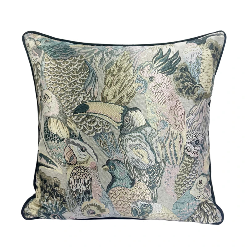 Decorative pillow with bird pattern on a white background