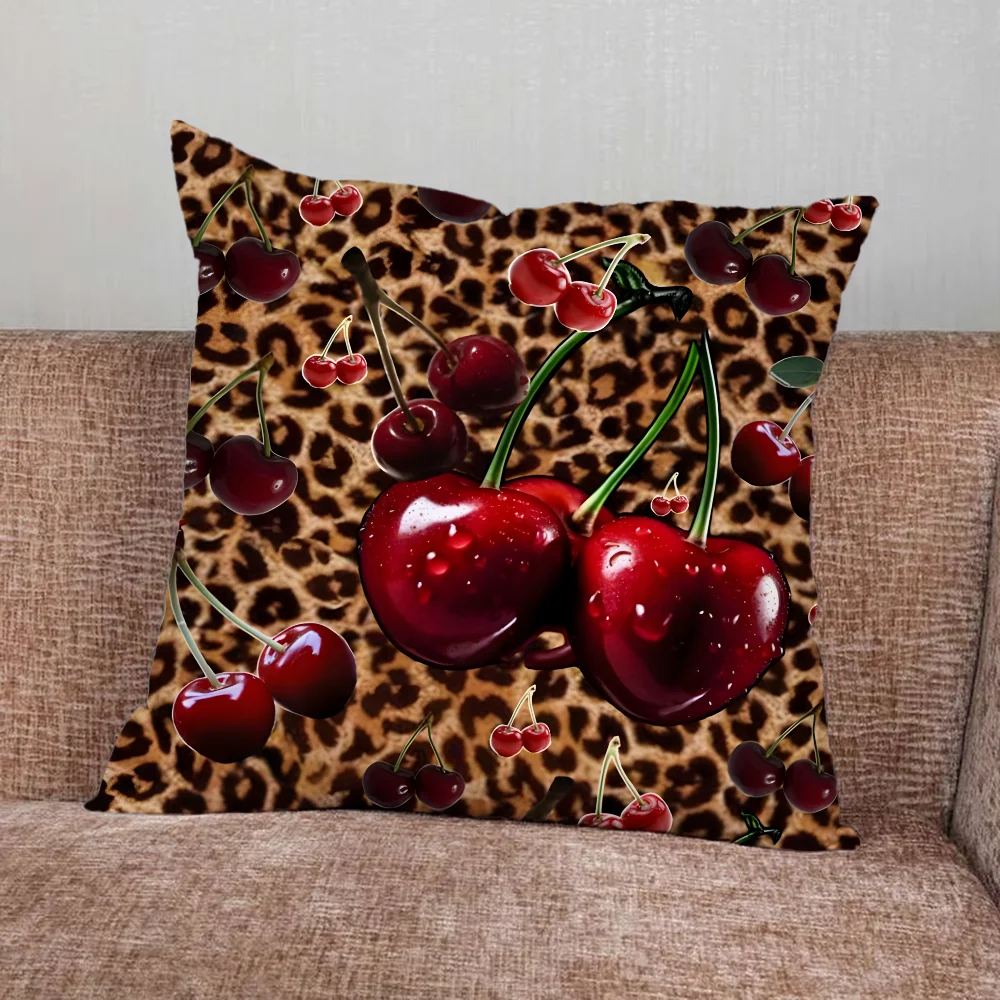 Leopard print pillow cover with cherry and star graphics in playful modern design
