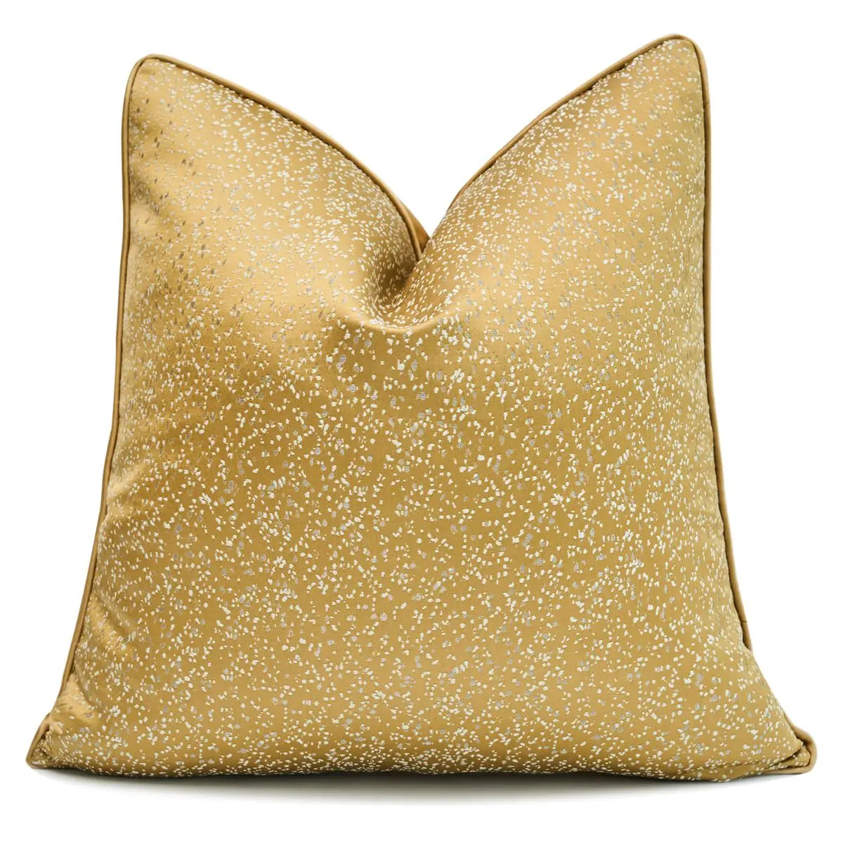 Gold glittery pillow on a white background