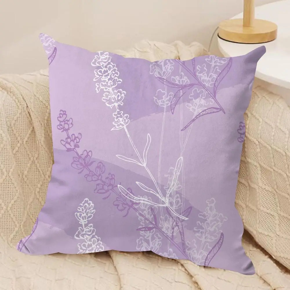 Decorative pillow with floral pattern on a beige couch