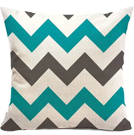 Decorative pillow with chevron pattern in teal, gray, and beige on a white background