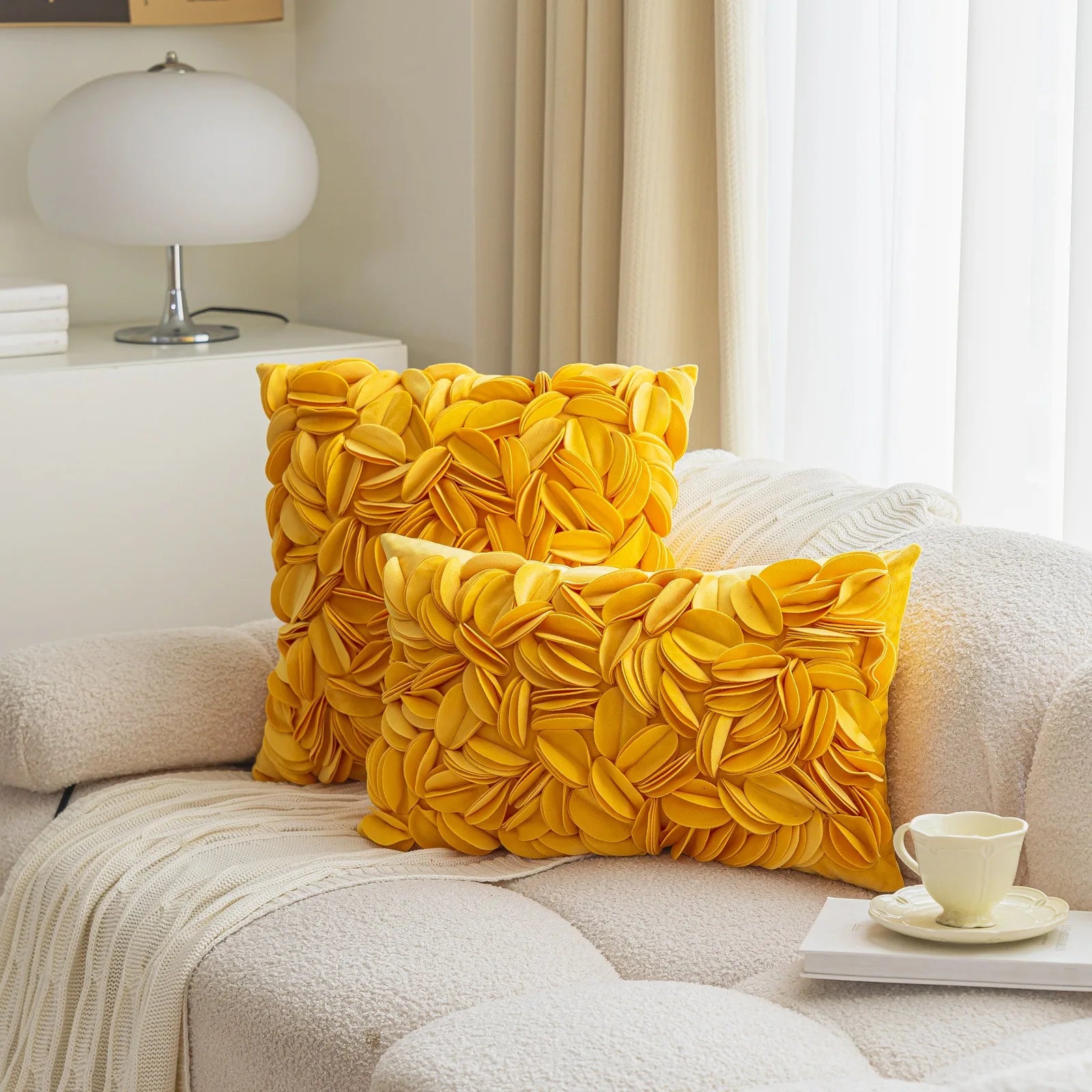 Yellow luxury velvet pillow cover with floral petal embroidery and elegant textured design