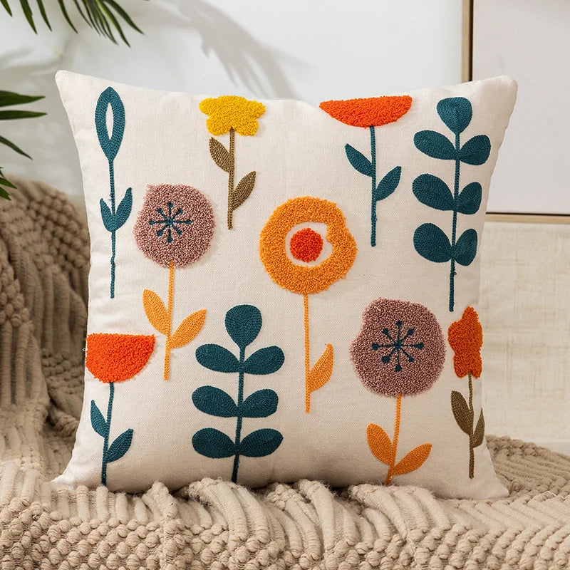 Decorative pillow with floral pattern on a textured surface