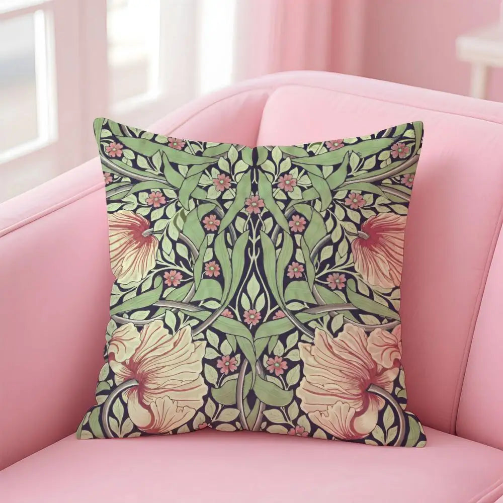 Decorative pillow with floral pattern on a pink sofa