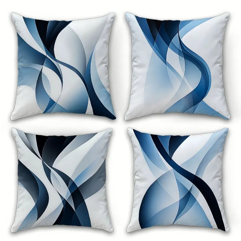 Four square pillows with abstract blue and black pattern on a white background