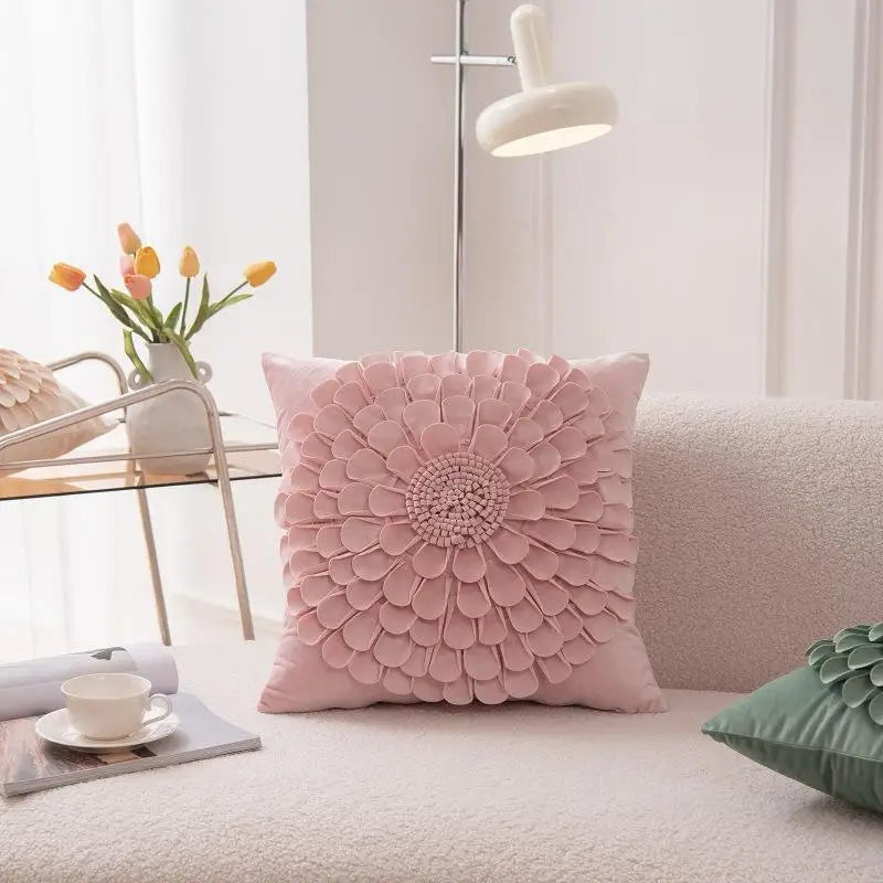 Pink flower velvet pillow cover with 3D petal texture on sofa