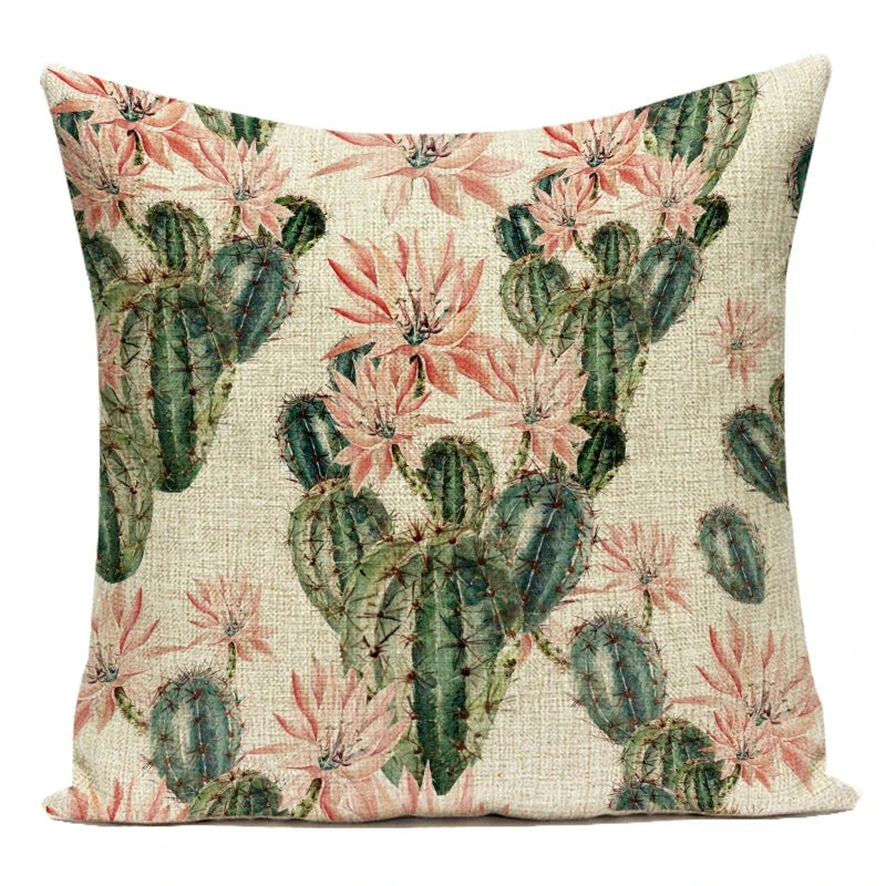 Decorative pillow with cactus and flower pattern on a beige background