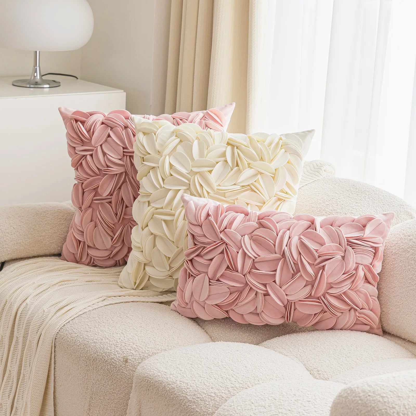 Luxury velvet pillow cover with floral petal embroidery and elegant textured design