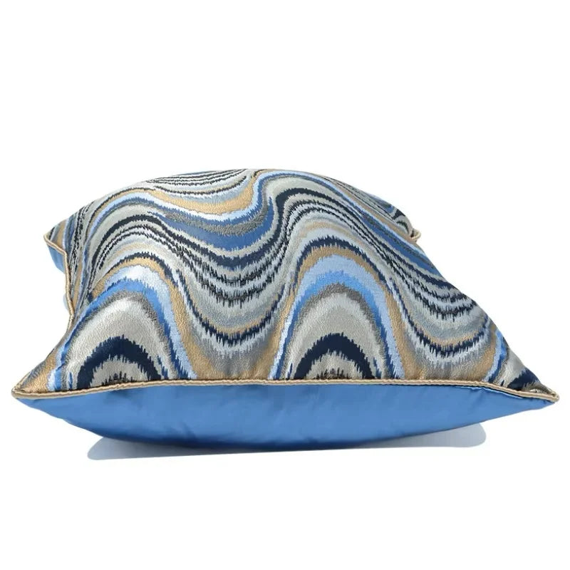 Decorative pillow with wavy pattern on a white background