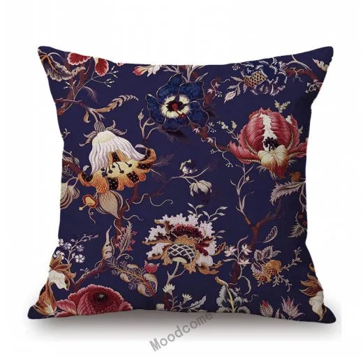 Decorative pillow with floral pattern on a white background