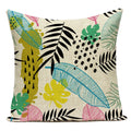 Decorative pillow with colorful leaf pattern on a beige background