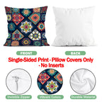 Colorful patterned pillow cover with plain white pillow on a white background
