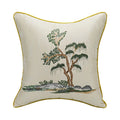 Decorative pillow with tree design on a white background