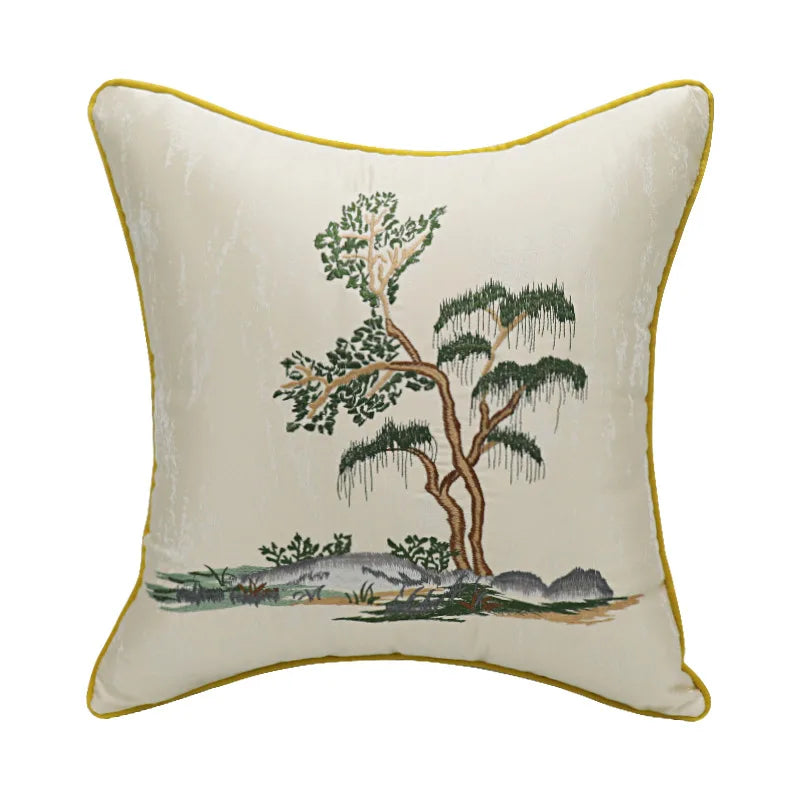 Decorative pillow with tree design on a white background