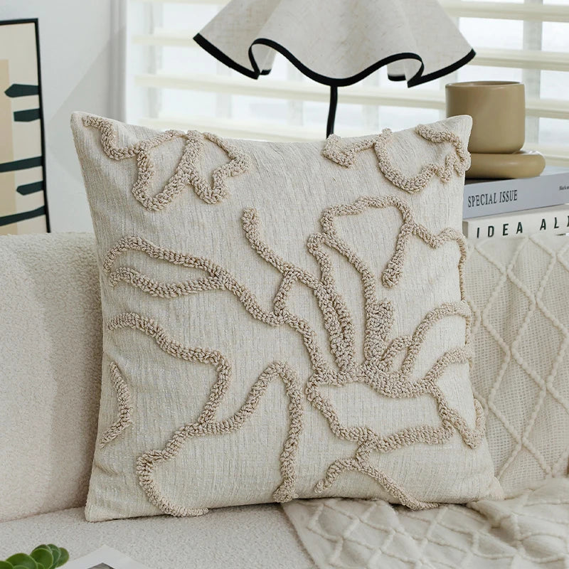 Decorative pillow with intricate patterns on a couch
