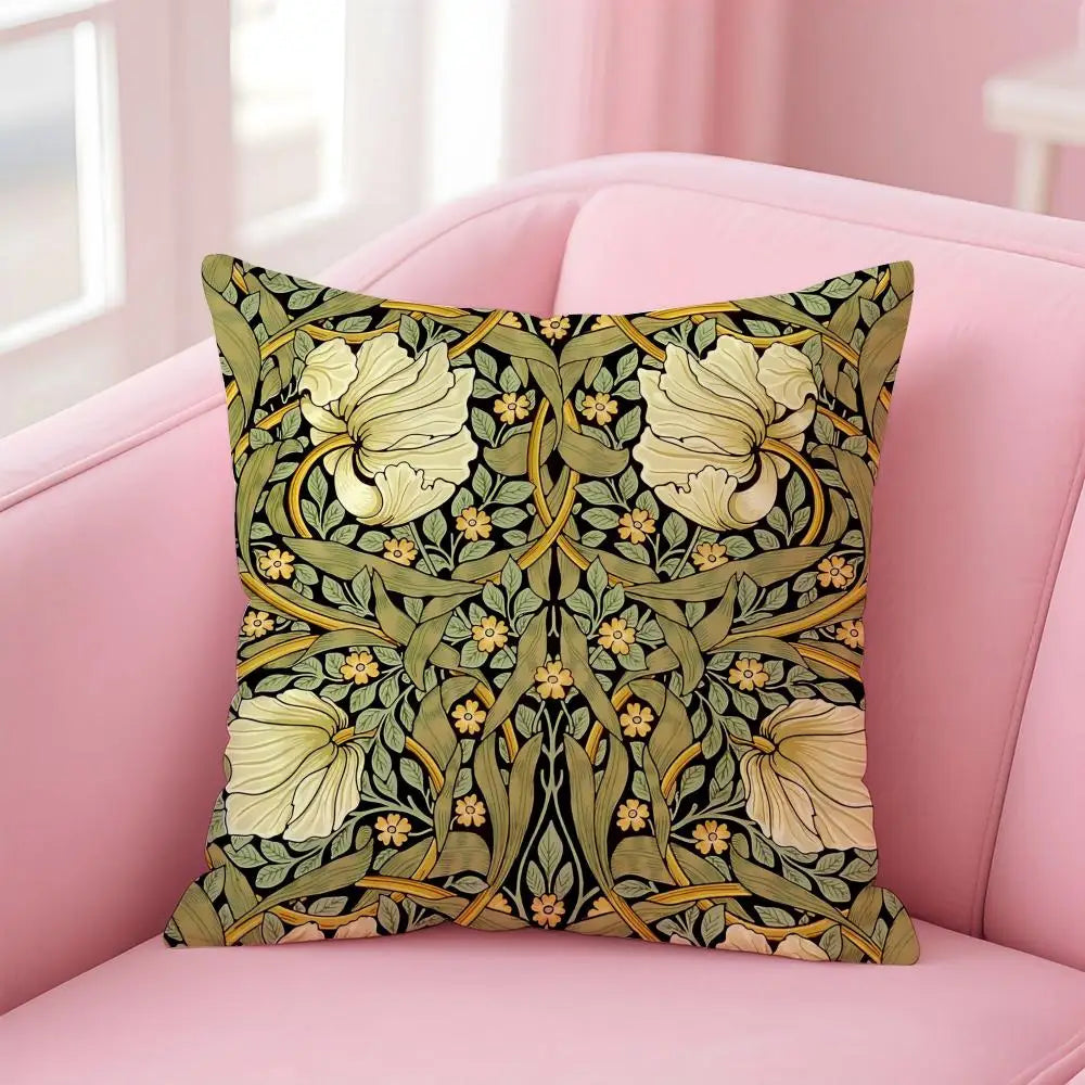 Decorative pillow with floral pattern on a pink sofa