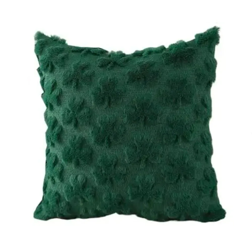 Green textured pillow on a white background