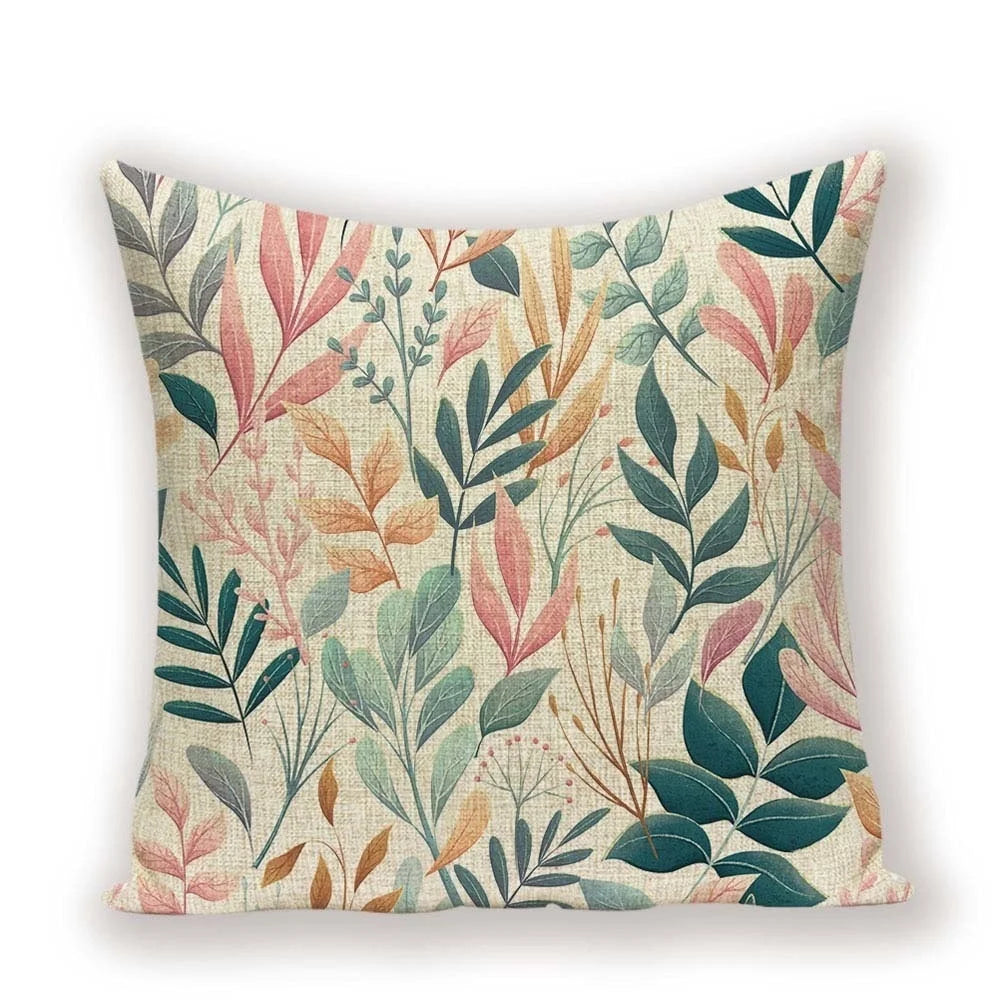 Decorative pillow with a leaf pattern on a beige background