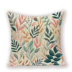 Decorative pillow with a leaf pattern on a beige background