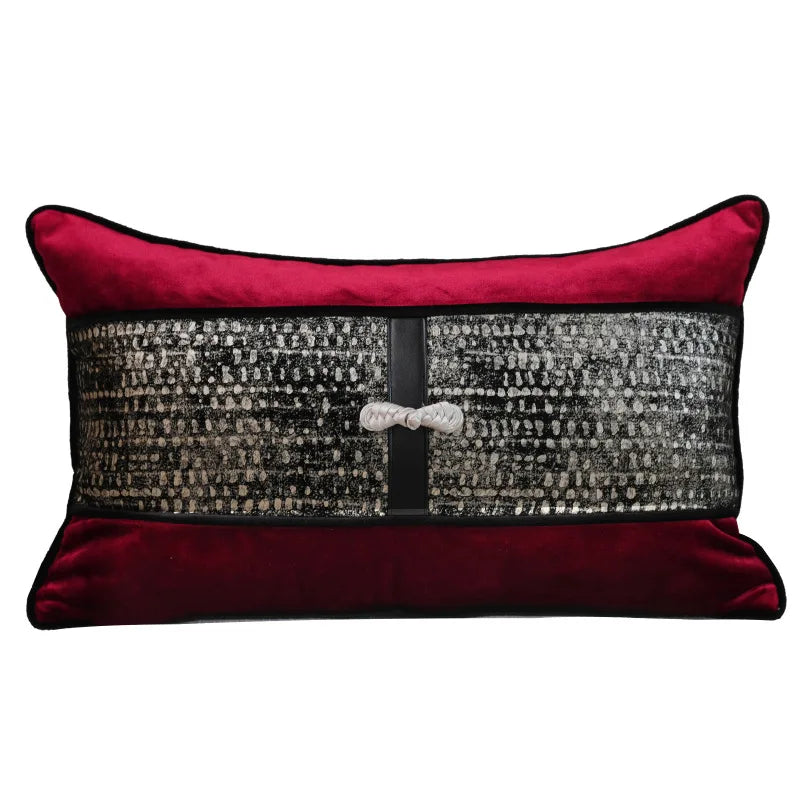 Decorative pillow with red and black color scheme on a white background