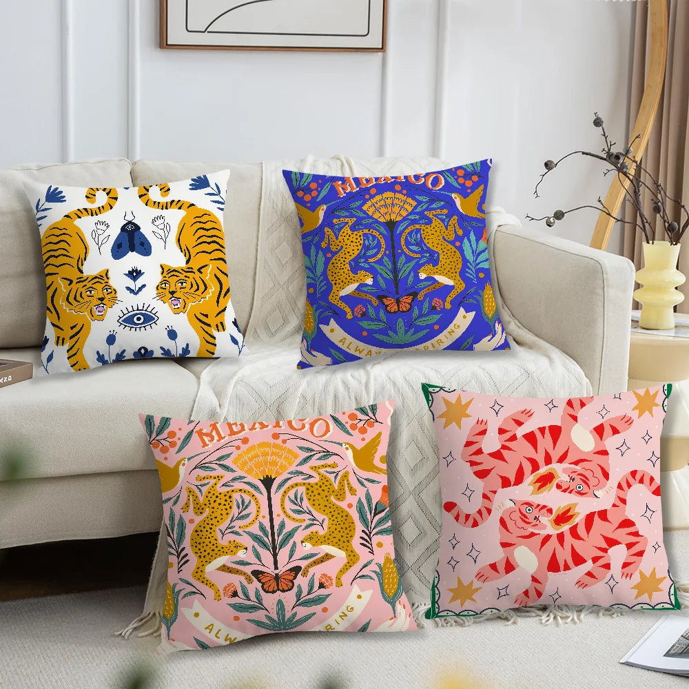 Colorful tiger-themed pillows on a sofa in a living room setting
