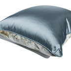 Gray pillow with floral pattern on a white background
