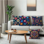 Living room with a white sofa adorned with colorful floral-patterned cushions, a wooden coffee table, and a plant.