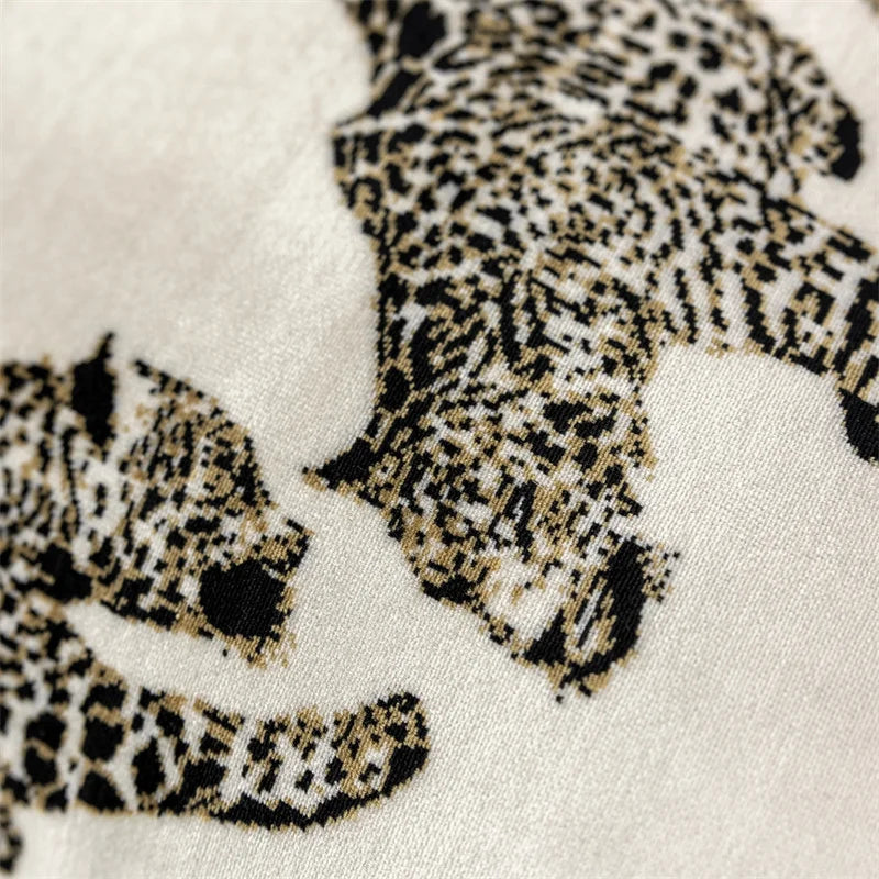Close-up of leopard print fabric with a white background