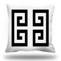 White pillow with black and white geometric pattern