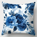 Floral pillow with blue roses on a white background