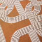 Close-up of a textured fabric with geometric pattern in brown and beige