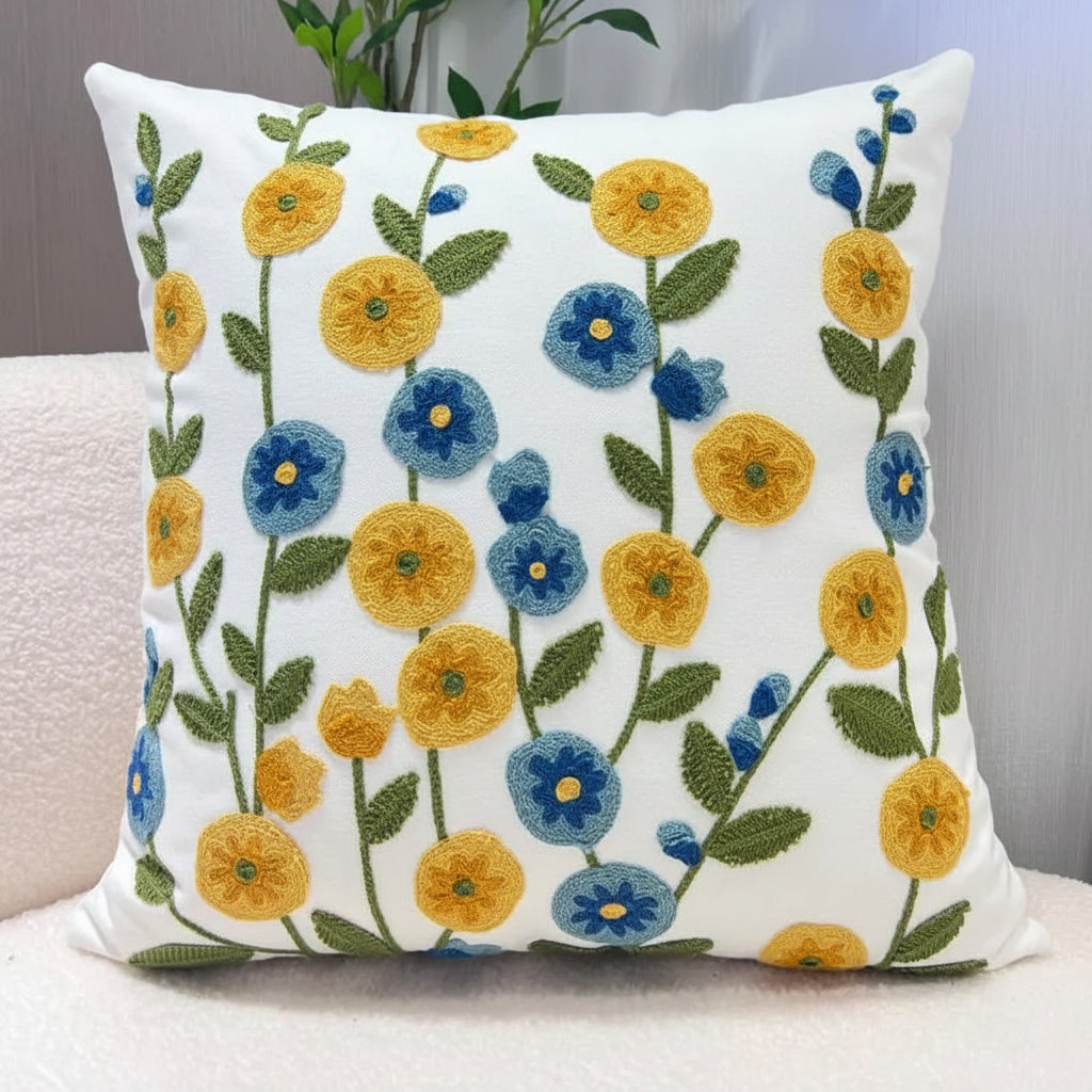 Decorative pillow with floral pattern on a plain background